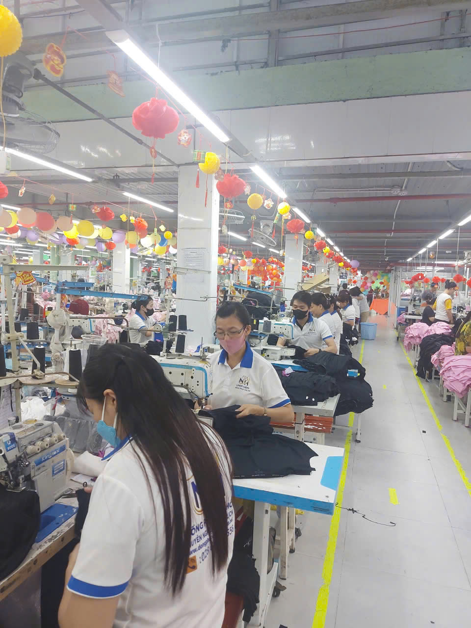 Đội ngũ kỹ thuật cắt may sản phẩm đồng phục ODM tại Nhị Hồ